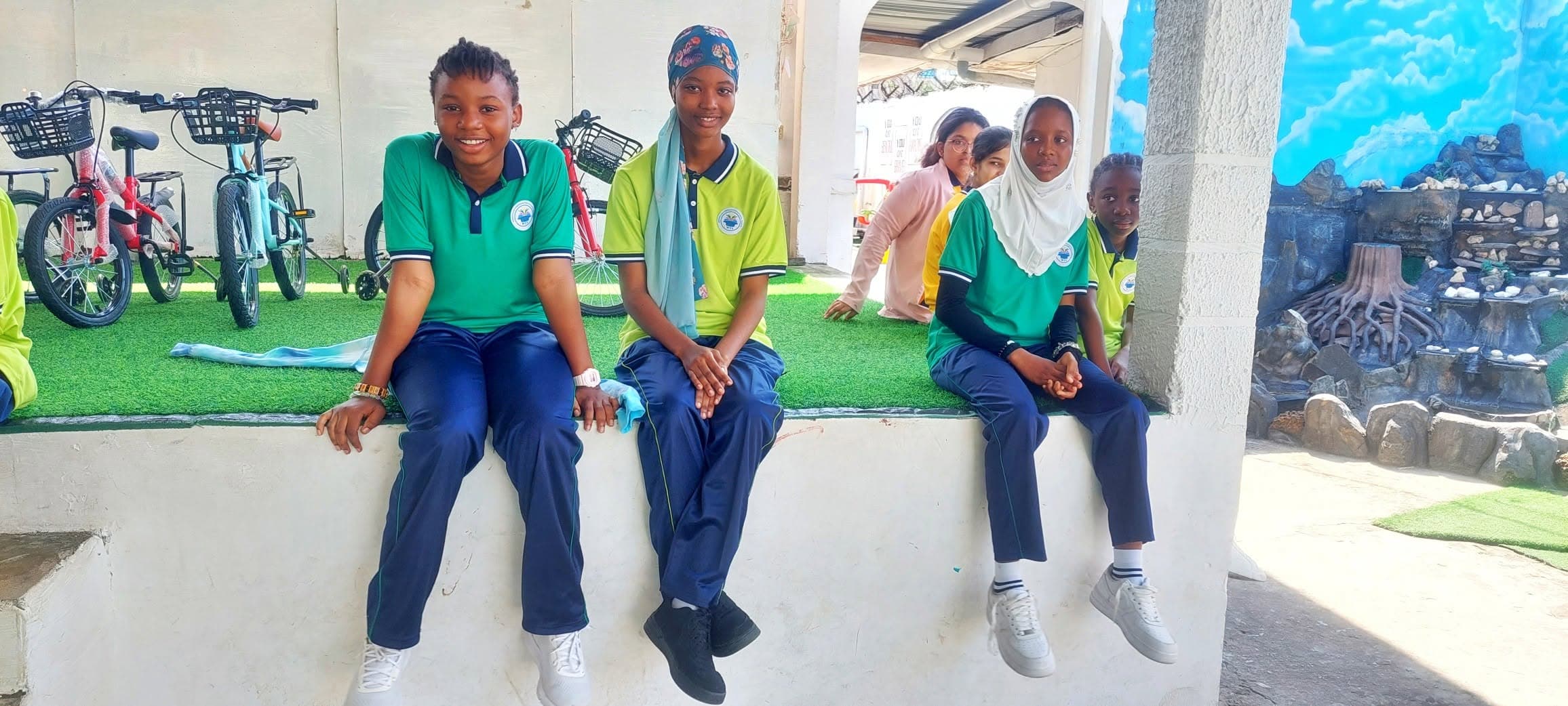 Students resting together after morning sports practice