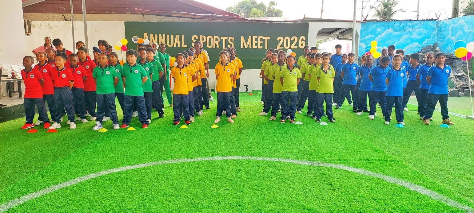 Students lined up in house colours at the Annual Sports Meet 2026